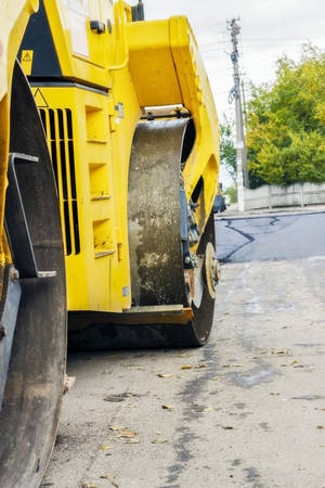 Road repair, the replacement of asphalt using machinery.の写真素材