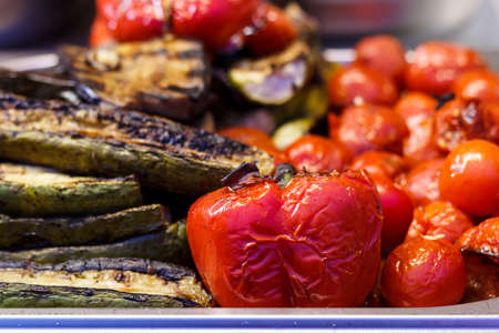 Freshly cooked grilled vegetables, tomatoes, mushrooms, eggplant, pepper ...の写真素材