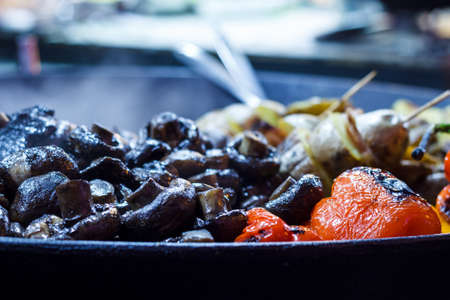 Freshly cooked grilled vegetables, tomatoes, mushrooms, eggplant, pepper ...の写真素材