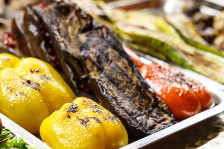 Freshly cooked grilled vegetables, tomatoes, mushrooms, eggplant, pepper ...の写真素材