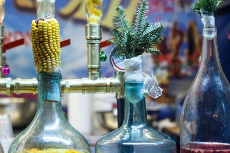 Large bottles of liquor closed corn cob.の写真素材