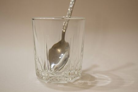 Silverware or Cutlery and shot glasses. Isolated on white background.の写真素材