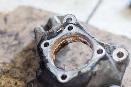 Car wheel bearings and wheel hubs that were changed from cars In a car repair shop or service center. Rusty partの写真素材