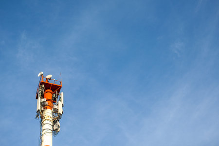 Technology on the top of the telecommunication GSM 5G, 4G, 3G tower.Cellular phone antennas on a...