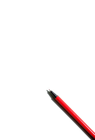 the red pen is ready to write text on a white background. The concept of working in the office, recording cases and goalsの写真素材