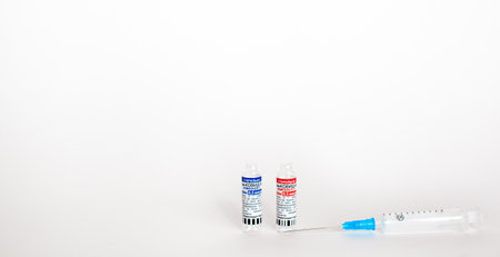 Kemerovo, Russia, July 2021. The coronavirus vaccine is in the hands of a doctor, a syringe. Coronavirus Covid 19 vaccine Sputnik V, local name GamCovidVac, produced in Russia and ready for injectionのeditorial素材