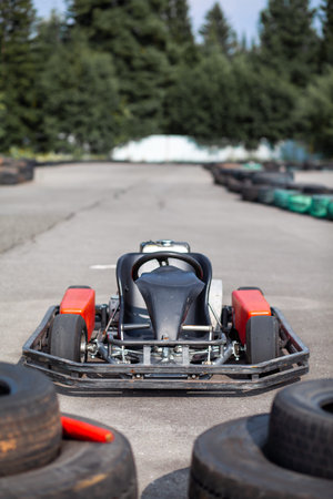 A go-karting car is standing on the highway and waiting for the driver. Go-karting cars for children...