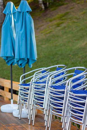 The chairs are on the wooden floor. Resorts are waiting for touristsの写真素材