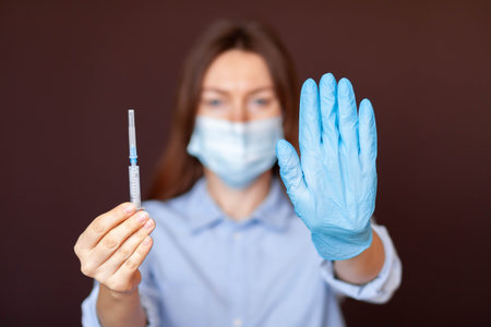Girl wearing mask for protection from diseaseの写真素材