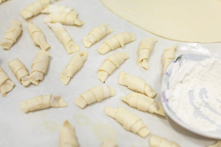 The process of making homemade croissants and other pastries at home. The family is cooking dessert...