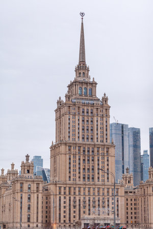 Moscow Russia - 1.04.2022. Radisson Collection Hotel, Moscow, a luxury hotel overlooking the Moskva River. View of the one of seven Stalinist skyscrapers Hotel Ukraine Building in central Moscowのeditorial素材