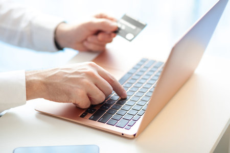 Purchases via the Internet and payment for services buy credit card. Hands type text and enter data...