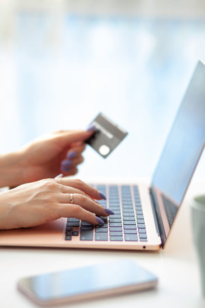 Purchases via the Internet and payment for services buy credit card. Hands type text and enter data...