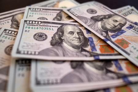 pile of one hundred US banknotes. Background with money american hundred dollar bills. 100 bills...