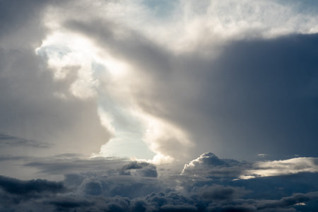 Dramatic sky with grey clouds over the city before the storm.