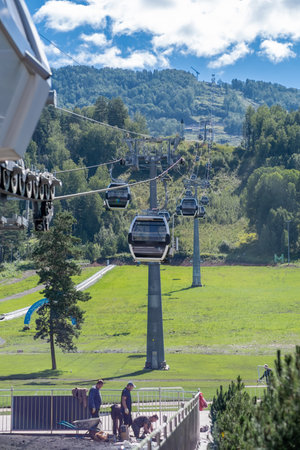 Close-up of a cable car cabin against the sky.のeditorial素材