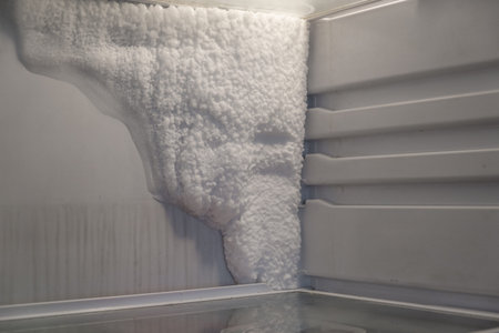 Frozen refrigerator that needs to be defrosted.