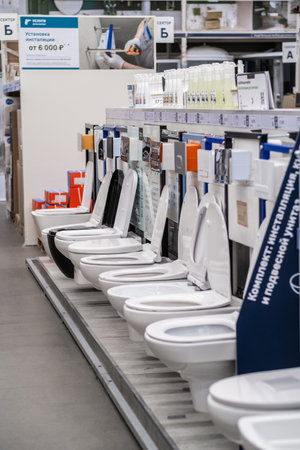 a row of toilets are lined up in a storeのeditorial素材