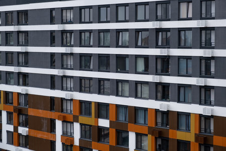 New apartment buildings with windows and balconies. Modern european complex