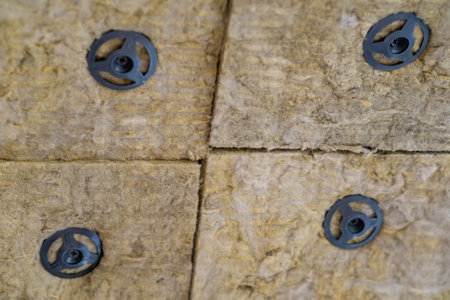 Insulation panels made of mineral wool, which were glued to the ceiling.