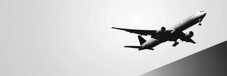 A sleek airplane silhouette against a clear sky, perfect for airlines and flight booking agencies seeking a modern design element.の素材