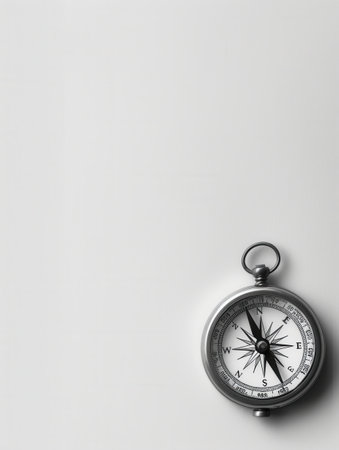 A classic compass with a black needle pointing north on a white background.の素材