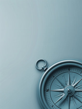 A simple compass with clear lines against a light blue background. This image is ideal for navigation apps and travel services.の素材