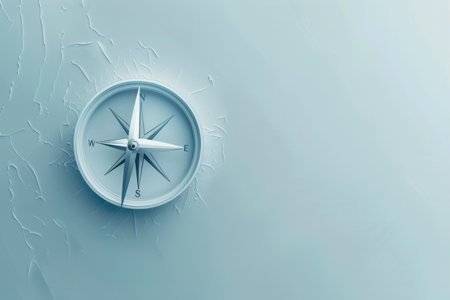 A compass with clear lines against a light blue background. Ideal for navigation apps and travel services.の素材