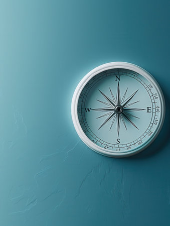 A classic compass with clear lines and a teal background, ideal for navigation apps and travel services.の素材