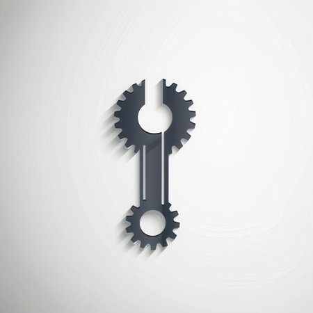 A minimalist logo showcases two black gears interconnected against a light backdrop, symbolizing collaboration and innovation in engineering design.の素材