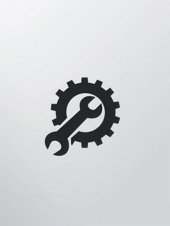 A minimalist logo showcases a wrench integrated within a gear, symbolizing mechanical work and engineering.の素材