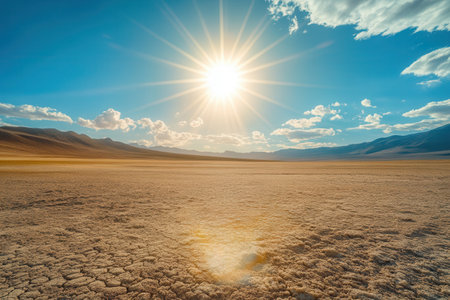 The vast desert landscape bakes under a blazing sun, reflecting the urgent consequences of climate change and melting glaciers.の素材