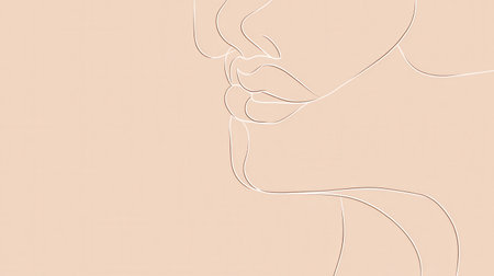 A beautifully crafted silhouette captures the essence of a woman's face with elegant lines on a warm-toned background.の素材