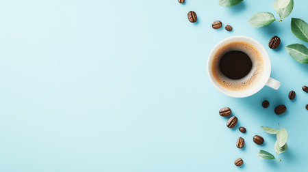 A fresh cup of coffee is surrounded by coffee beans and green leaves, creating a serene morning atmosphere on a light blue background.の素材