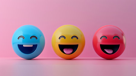 Three vibrant emoji faces with big smiles and cheerful expressions stand on a soft pink backdrop, creating a joyful ambiance.の素材