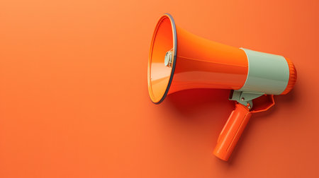 The megaphone, designed in vibrant orange, emphasizes communication, ideal for events or campaigns in lively environments.の素材