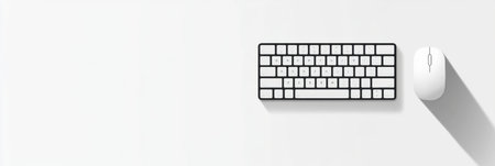A white keyboard and mouse are placed neatly on a light surface, showing a minimalist design ideal for productivity and focus.の素材