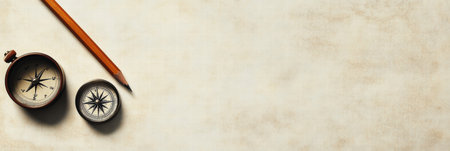 A vintage map is accompanied by a compass and a pencil, perfect for planning adventures and outlining travel routes with empty space for notes.の素材