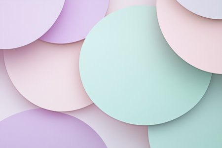 Soft pastel circles overlap in a harmonious arrangement, providing a gentle backdrop ideal for adding text or creative designs.の素材
