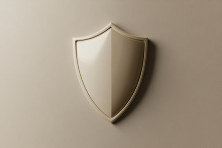 A simple shield emblem rests on a smooth, beige wall, showing its elegant design and minimalistic aesthetic for decorative purposes.の素材