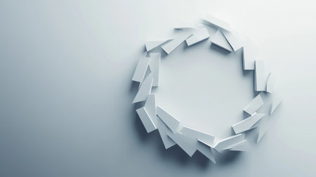 White paper fragments are creatively arranged in a circular pattern, highlighting both structure and artistic minimalism in a clean setting.の素材