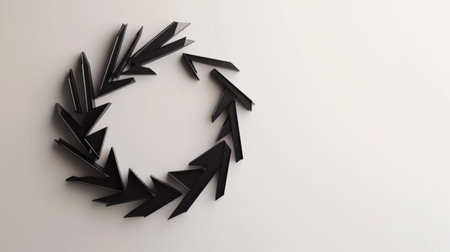 A unique wreath made of angular black arrows hangs decoratively on a plain wall, adding a contemporary touch to the space.の素材