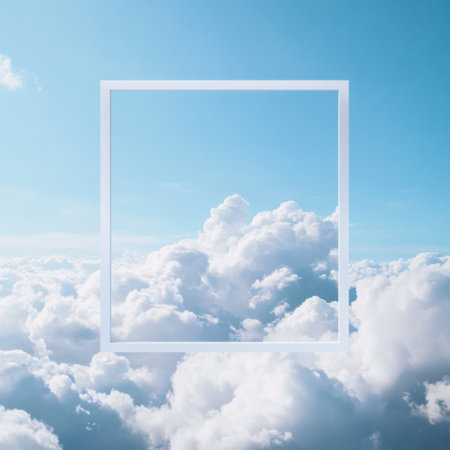 Fluffy white clouds fill the frame in a bright blue sky, with sunlight creating a serene atmosphere in the afternoon.の素材