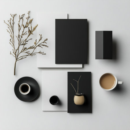 A stylish flat lay features a mix of black and white stationery, cups of coffee, and natural decor on a smooth surface.の素材