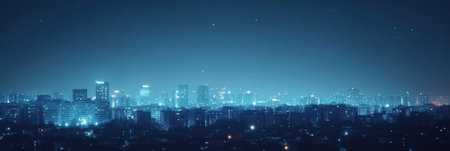 A stunning city skyline illuminated by bright artificial lights against a backdrop of twinkling stars, embodying urban nightlife.の素材