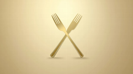 Two golden forks crossed over a soft golden background, representing elegance and sophistication in dining and culinary arts.の素材