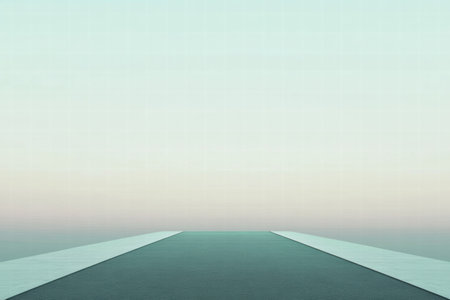 A long, smooth pathway stretches into the horizon under a gentle pastel sky at dawn, inviting quiet moments of introspection.の素材