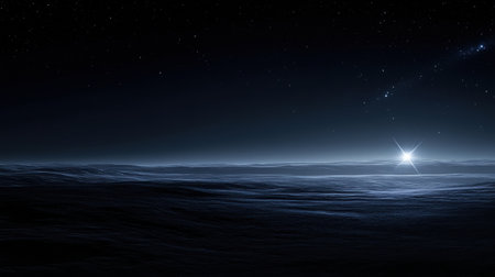 A bright celestial body rises over calm ocean waves, illuminating the dark waters as stars twinkle in the twilight sky.の素材