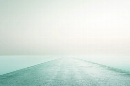 Fog envelops the landscape, creating a serene atmosphere over calm waters and a path, capturing the tranquility of early morning light.の素材