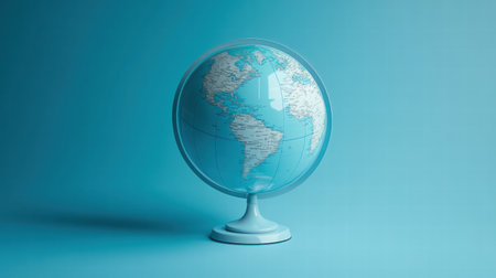This globe on a blue background highlights continents, countries, and oceans, making it a perfect educational tool for geography enthusiasts.の素材
